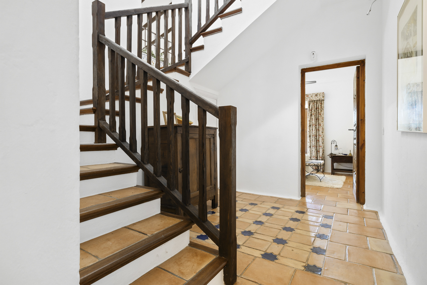 Stairs to first floor with master bedroom